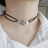 Collier de menottes en argent sur cordon