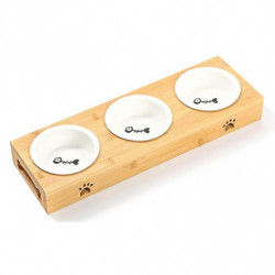 Bol de nourriture spécial pour chats et chiens de compagnie, bol en céramique sur table en bois Bol de nourriture spécial pour chats et chiens de compagnie, bol en céramique sur table en bois